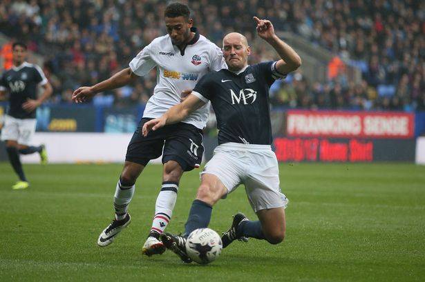 PAY-Keshi-Anderson-of-Bolton-Wanderers-and-Adam-Barrett-of-Southend-United.jpg